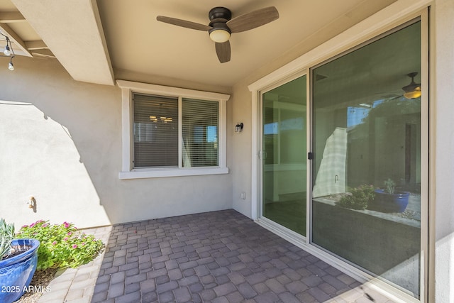view of patio / terrace featuring ceiling fan