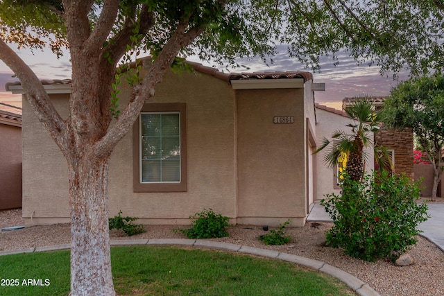 14864 W Riviera Dr, Surprise, AZ 85379 - view of front facade featuring stucco siding and a tiled roof