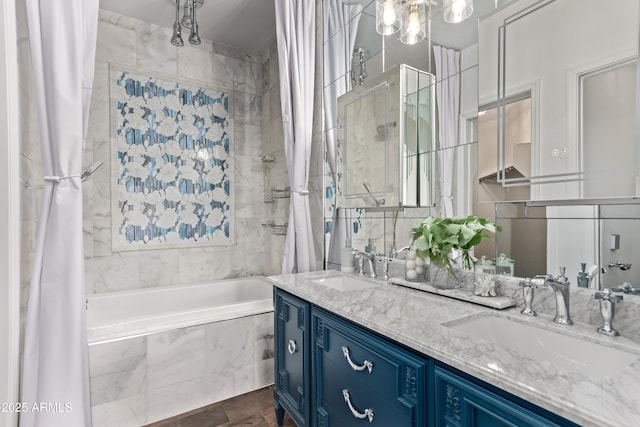 14864 W Riviera Dr, Surprise, AZ 85379 - bathroom with tiled shower / bath and double vanity