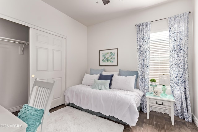 14864 W Riviera Dr, Surprise, AZ 85379 - bedroom with wood finished floors, a closet, and ceiling fan