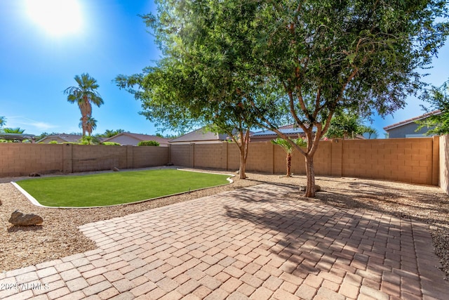 14864 W Riviera Dr, Surprise, AZ 85379 - fenced backyard featuring a patio area