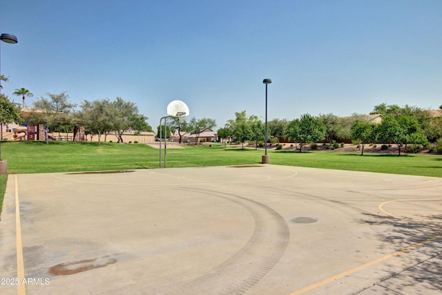 14864 W Riviera Dr, Surprise, AZ 85379 - view of basketball court featuring a lawn and community basketball court