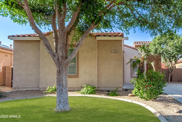 14864 W Riviera Dr, Surprise, AZ 85379 - view of front of house with a tile roof and stucco siding
