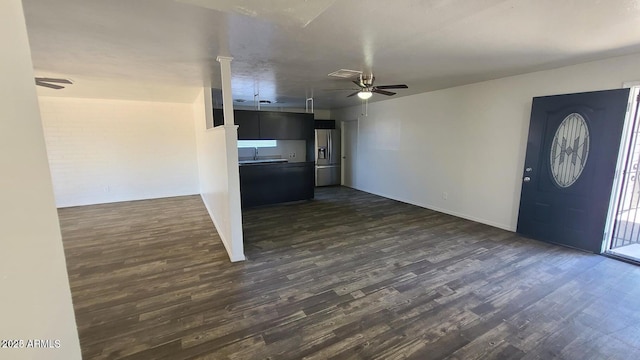 2908 N 53rd Ln, Phoenix, AZ 85031 - foyer featuring ceiling fan, dark wood finished floors, and baseboards