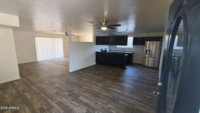 2908 N 53rd Ln, Phoenix, AZ 85031 - kitchen featuring stainless steel refrigerator with ice dispenser, ceiling fan, open floor plan, and a sink