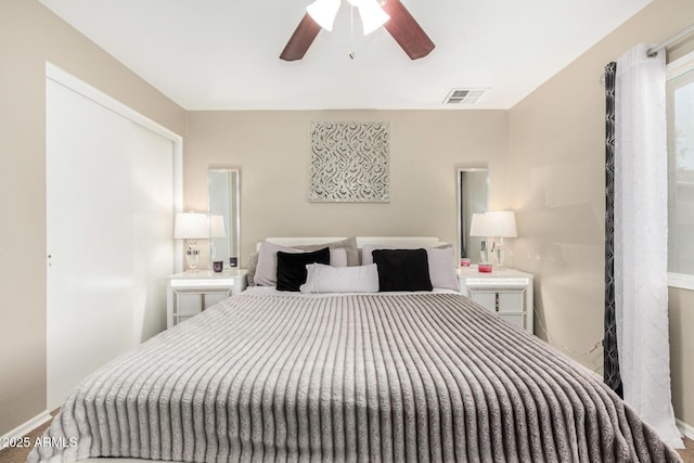 9028 W Osborn Rd, Phoenix, AZ 85037 - bedroom with visible vents, a ceiling fan, and baseboards