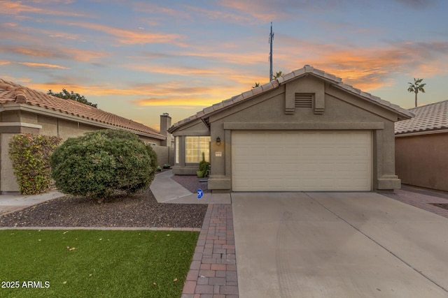 view of front of property featuring a garage