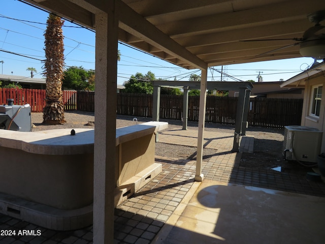 view of patio featuring cooling unit