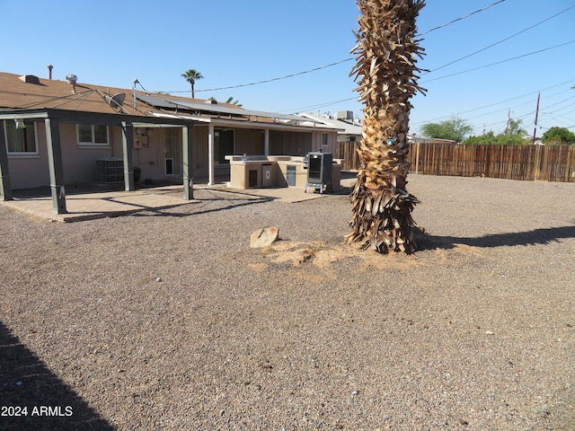 back of house featuring a patio