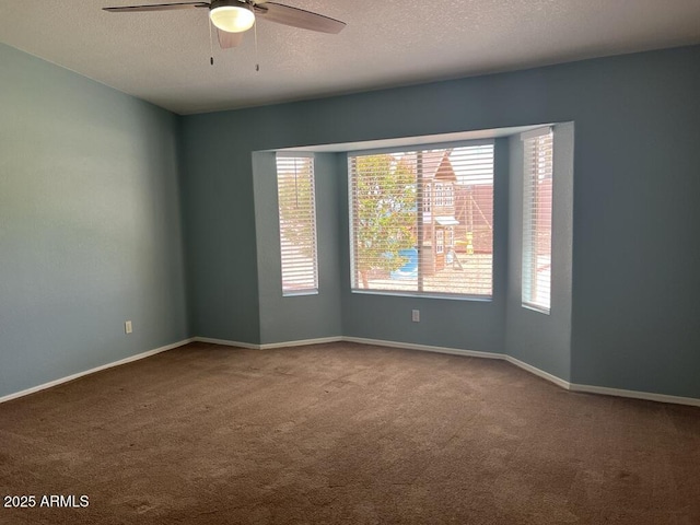 3876 Camino Del Vara, Sierra Vista, AZ 85650 - unfurnished room with carpet, ceiling fan, a textured ceiling, and baseboards
