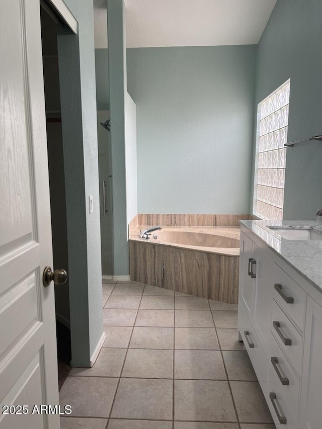 3876 Camino Del Vara, Sierra Vista, AZ 85650 - full bath featuring tile patterned floors, a bath, vanity, and a shower