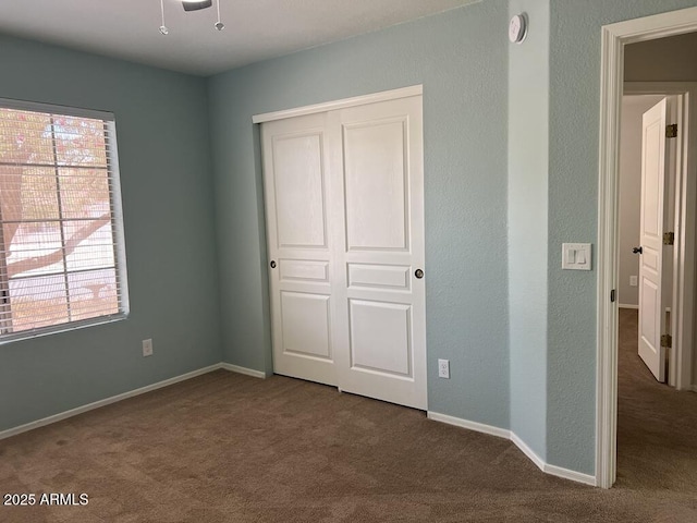 3876 Camino Del Vara, Sierra Vista, AZ 85650 - unfurnished bedroom with carpet, a closet, and baseboards