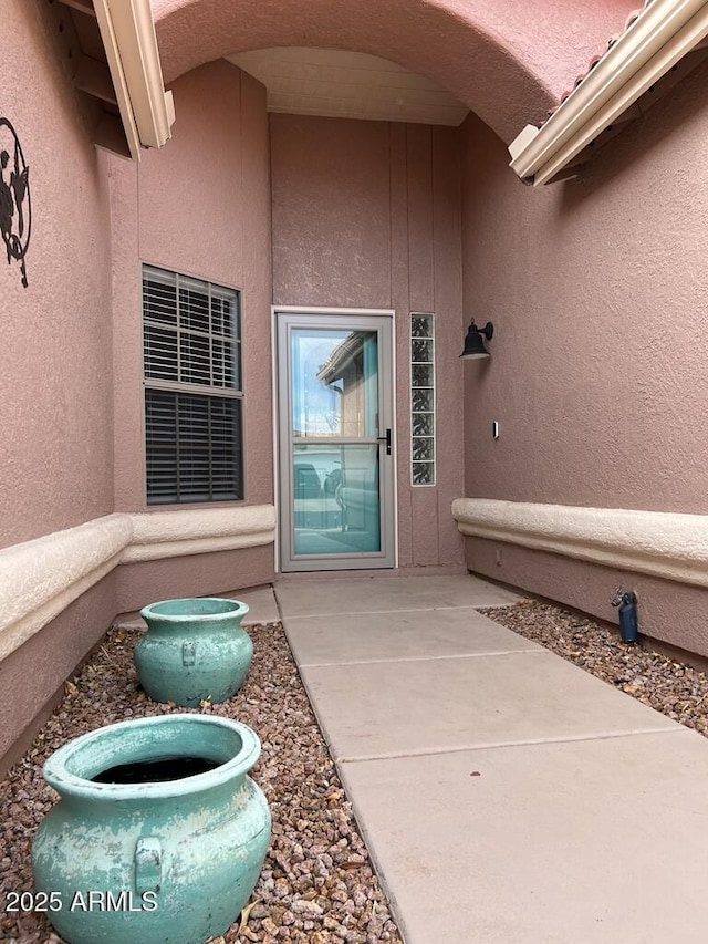 3876 Camino Del Vara, Sierra Vista, AZ 85650 - doorway to property with stucco siding and a patio area