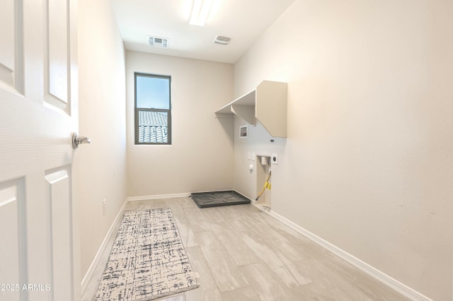 washroom with visible vents, gas dryer hookup, baseboards, hookup for an electric dryer, and laundry area