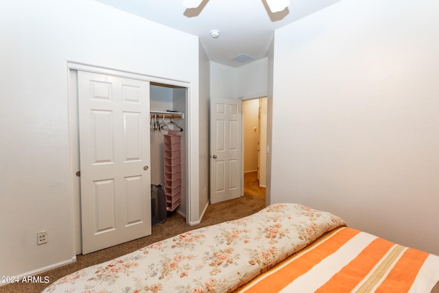 bedroom with a closet, ceiling fan, and carpet