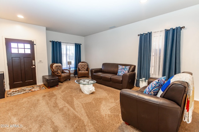 living room featuring light colored carpet