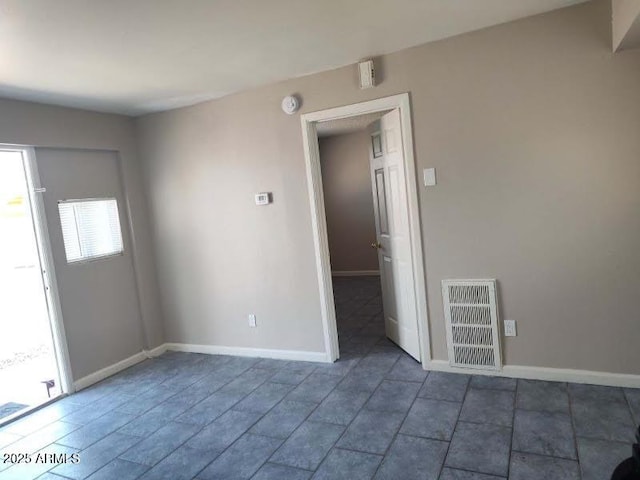 755 E Millett Ave, Mesa, AZ 85204 - tiled empty room featuring baseboards and a smoke detector