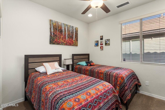 bedroom with carpet floors and ceiling fan