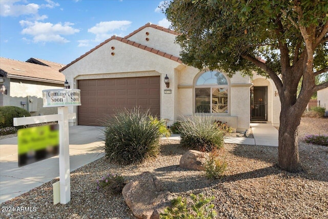 view of front of home with a garage