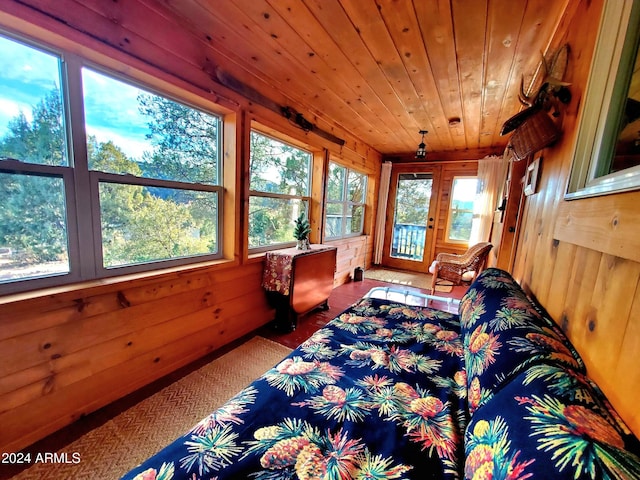 sunroom featuring wood ceiling