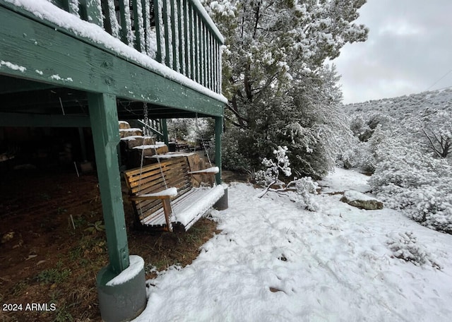 view of yard covered in snow