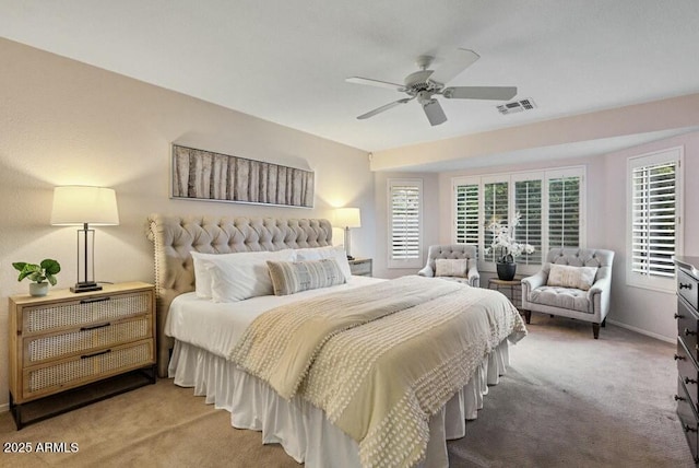 carpeted bedroom with ceiling fan