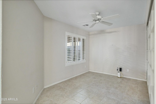 empty room featuring ceiling fan