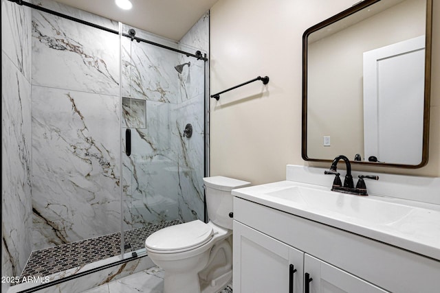 full bathroom featuring vanity, recessed lighting, toilet, marble finish floor, and a marble finish shower
