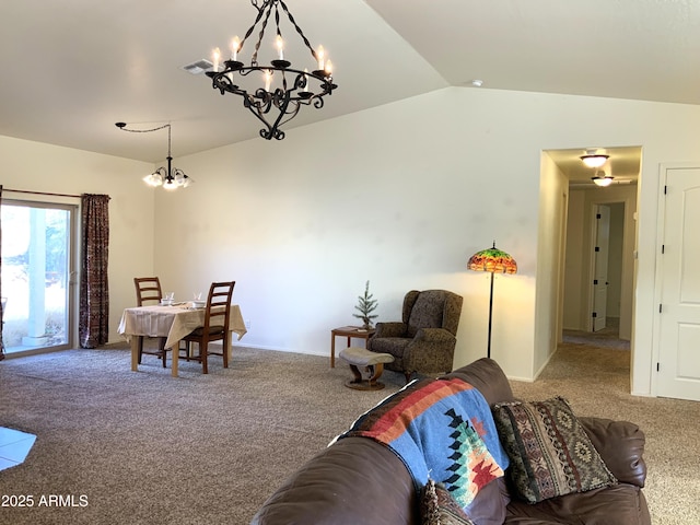 carpeted living room with a notable chandelier, visible vents, and lofted ceiling