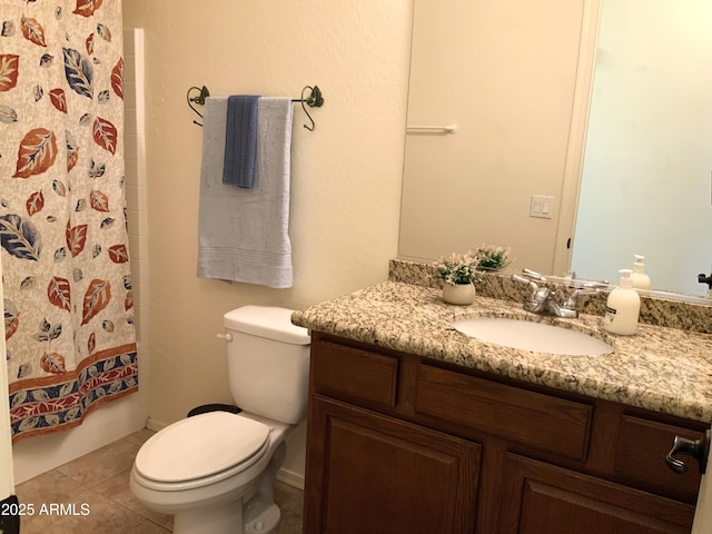 bathroom with shower / bathtub combination with curtain, toilet, vanity, and tile patterned flooring