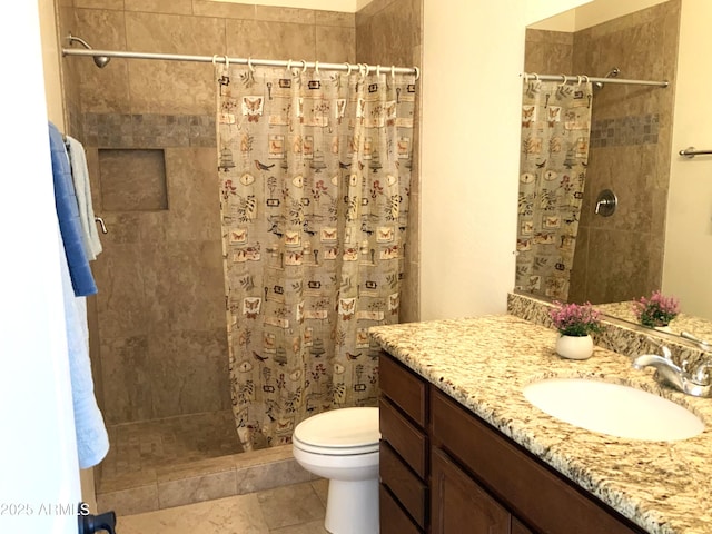 full bath with vanity, a shower stall, toilet, and tile patterned flooring