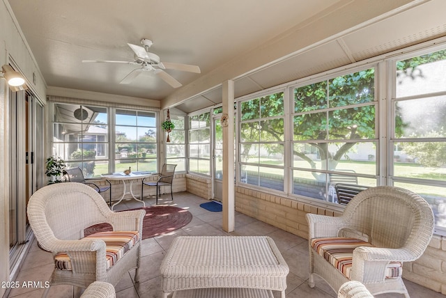 sunroom / solarium with ceiling fan