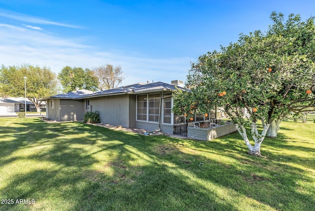 view of property exterior with a yard