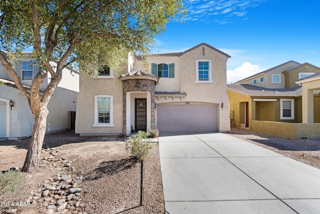 view of front of property featuring a garage