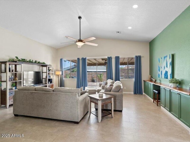 living room with ceiling fan, visible vents, a textured ceiling, baseboards, and vaulted ceiling