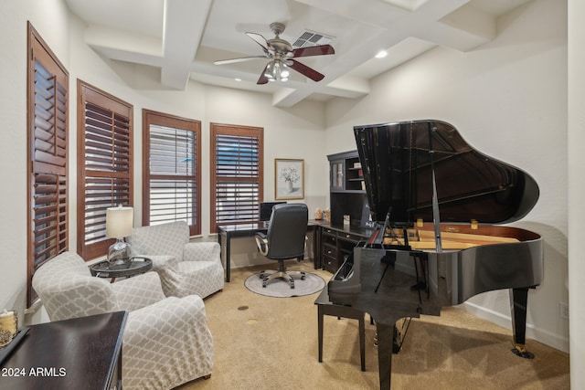 carpeted home office featuring ceiling fan, beamed ceiling, and coffered ceiling