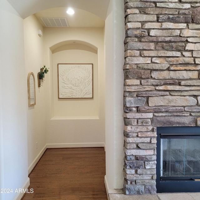 hallway featuring wood-type flooring