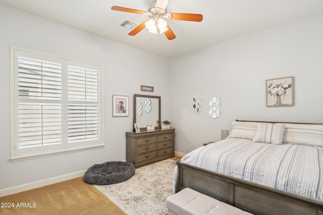 bedroom featuring ceiling fan and carpet floors