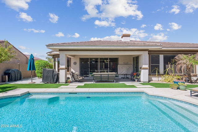 back of house featuring a patio