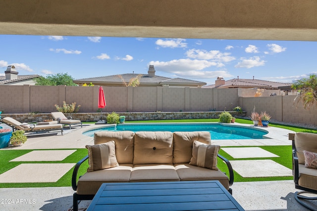 view of pool featuring a patio area