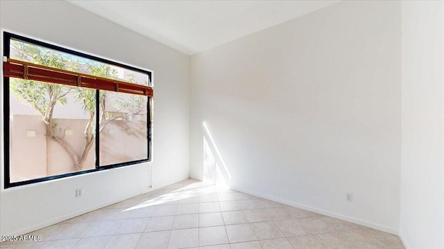 view of tiled empty room