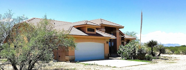 view of front of house with a garage