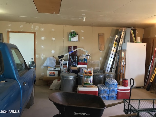 garage with white refrigerator