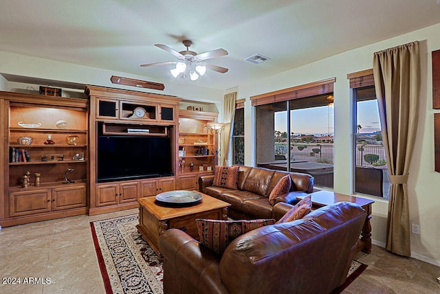 living room with ceiling fan