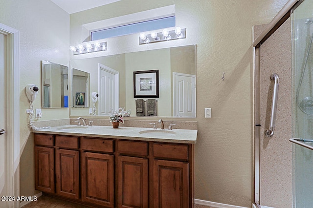 bathroom featuring vanity and walk in shower