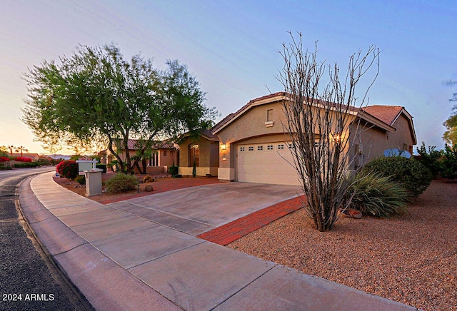 view of front of property featuring a garage