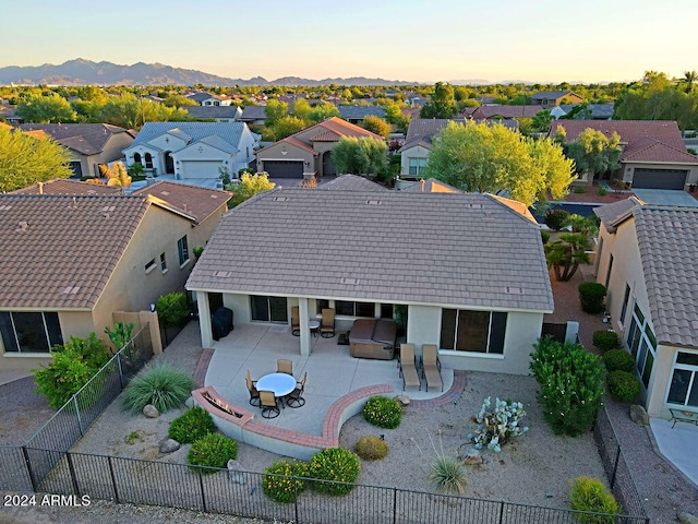 view of aerial view at dusk