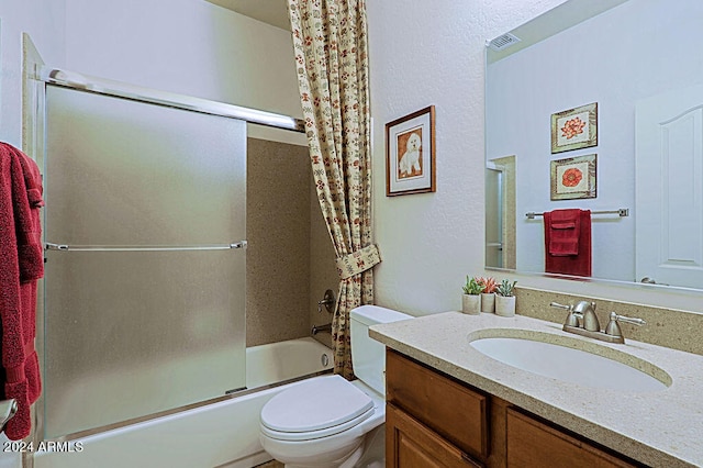 full bathroom with vanity, toilet, and shower / tub combo with curtain