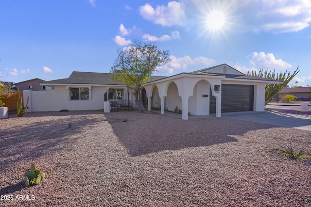 single story home featuring a garage and central air condition unit