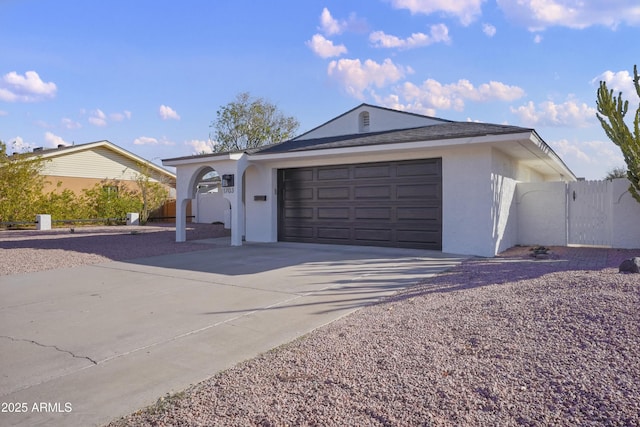 single story home with a garage